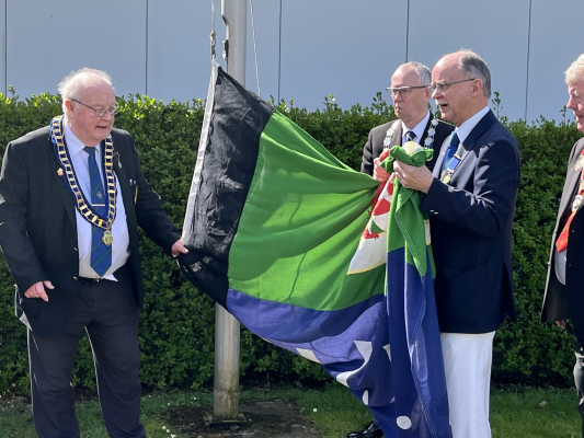 Handing over Flag